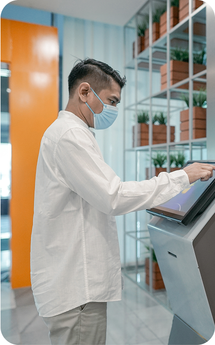 Accessing digital health services through a touchscreen kiosk.