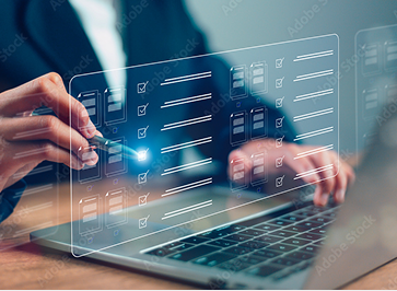 Close-up of a hand using a digital interface for patient check-in at a health facility.
